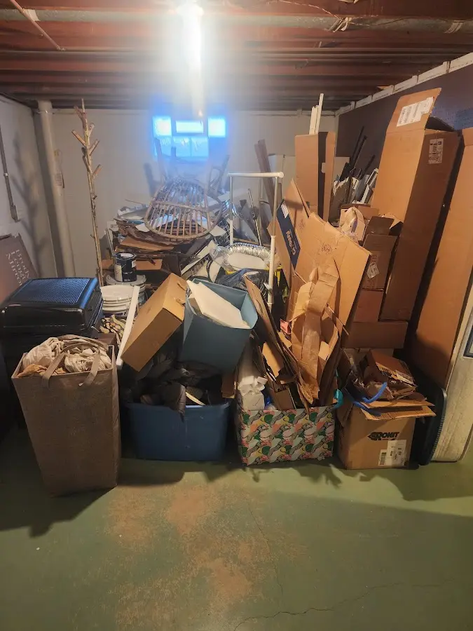 Roll-off dumpster container at job site for 2 Yard Dumpster Rental in Walkertown